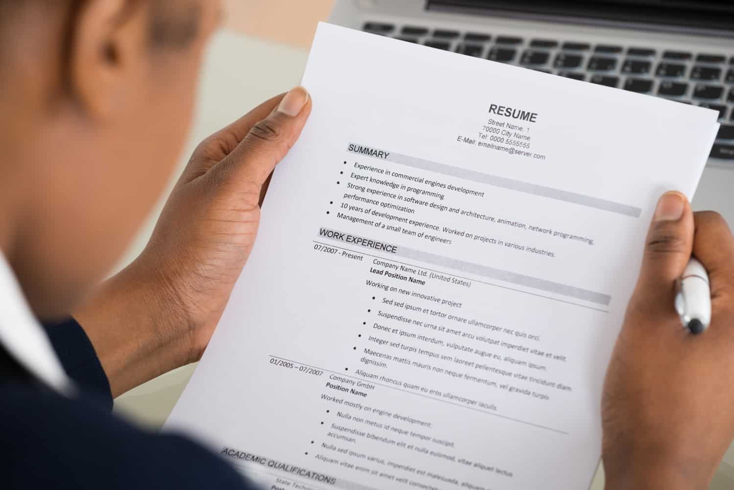 Man holding resume